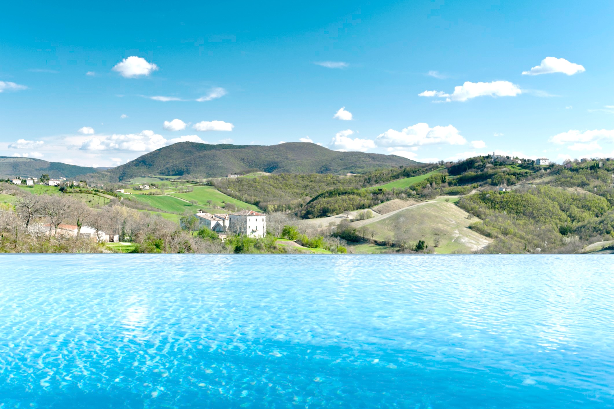 Borgo Tranquillo, villa rental in Le Marche, Italy. Beautiful view of the countryside from the infinity pool